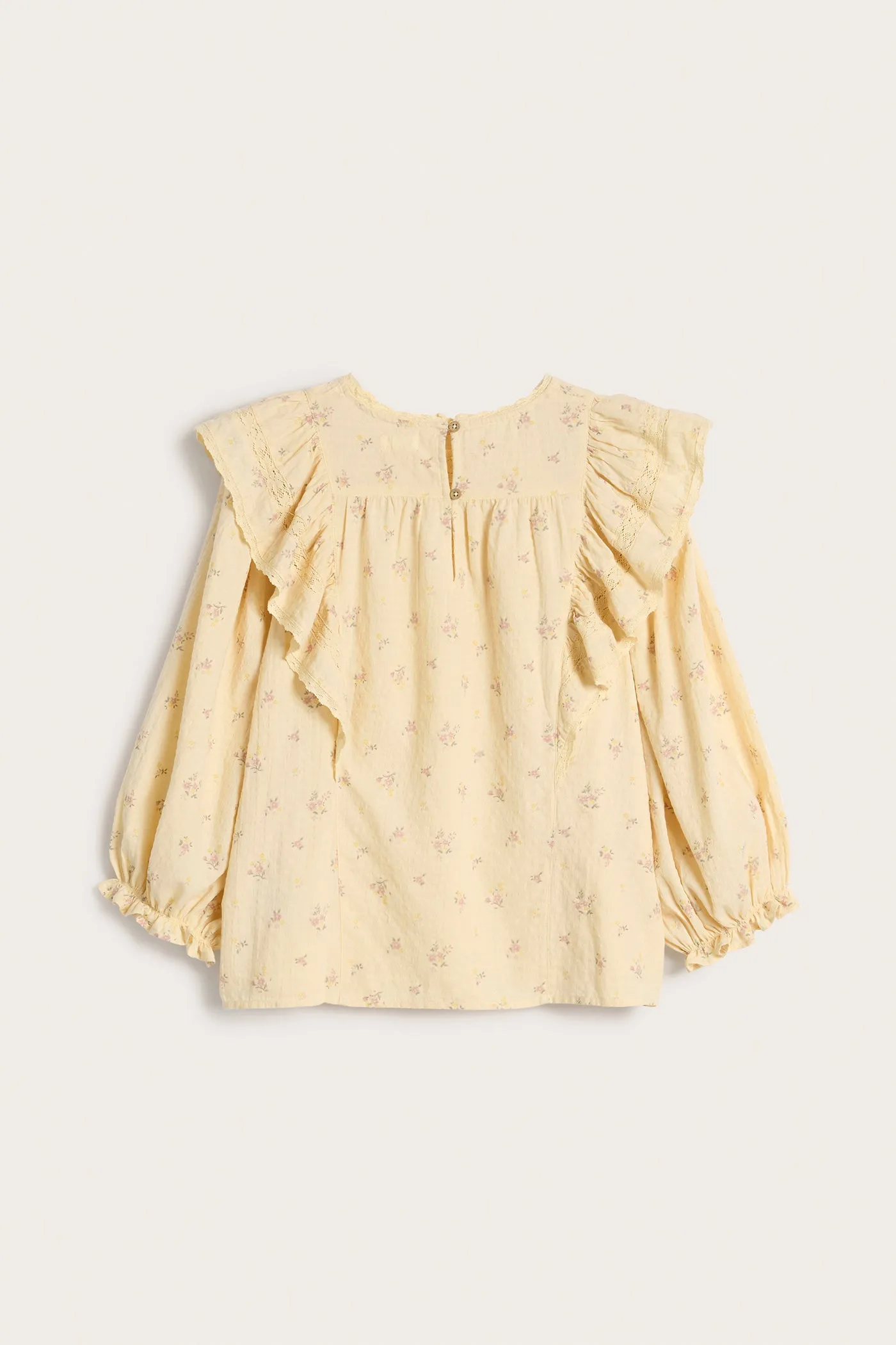 Women's yellow floral blouse